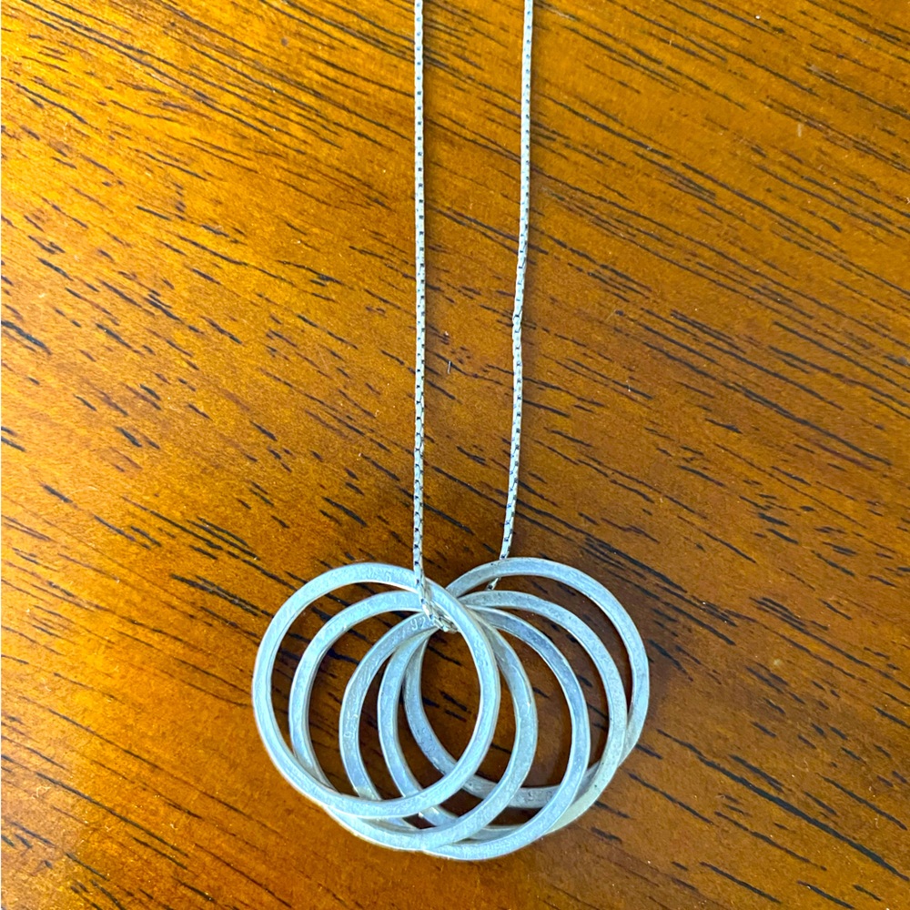 Silpada Sterling Silver necklace with 5 textured rings.